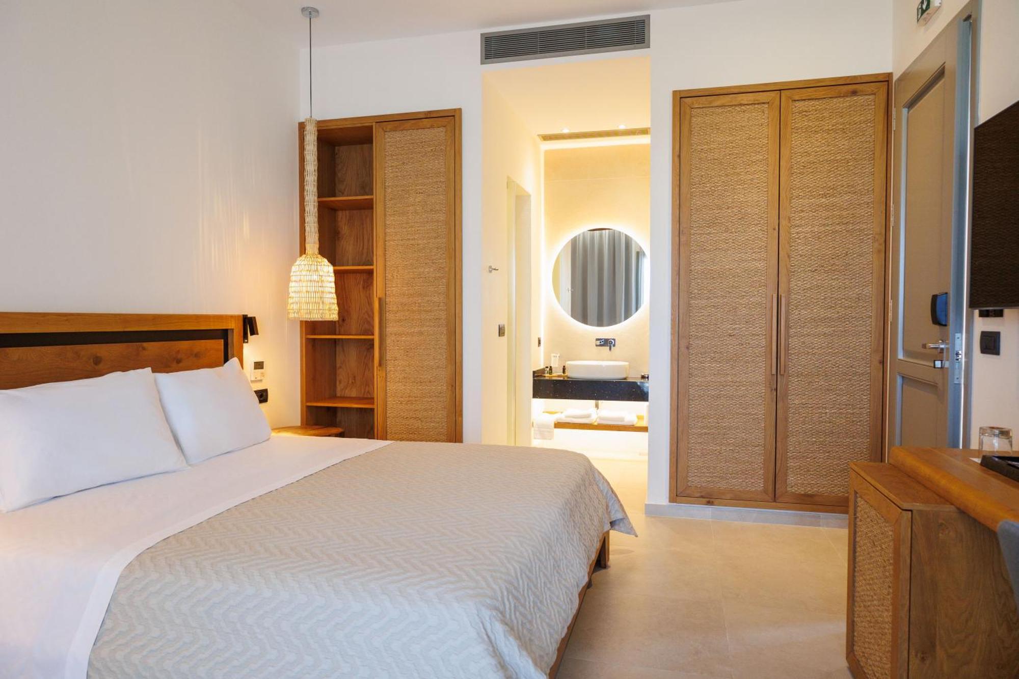 Kouros Blanc Resort & Suites Pounda Habitación foto